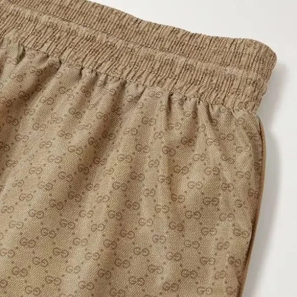 GUCCI
Slim-Fit Mid-Length Logo-Print Striped Swim Shorts - Picture 4 of 11